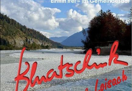 Un bel fiume con acqua limpida e circondato da montagne e alberi. La scena trasmette calma e connessione con la natura.