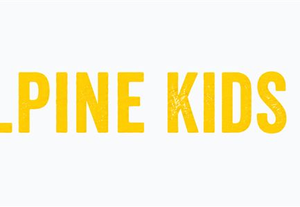 A cheerful logo for the Alpine Kids Club. It features the words "ALPINE KIDS CLUB" in vibrant yellow, surrounded by a sun.