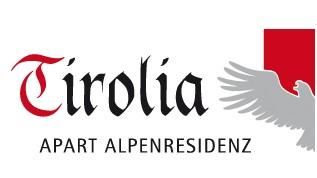 A modern logo of "Tirolia Apart Alpenresidenz". It features a stylized eagle and the lettering in elegant font.
